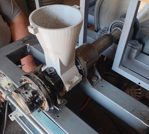 Prototype feed extruder hopper and barrel during assembly